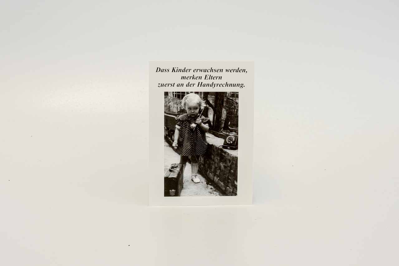 Postkarte schwarz/weiss mit Spruch zu Kindern und Handyrechnung